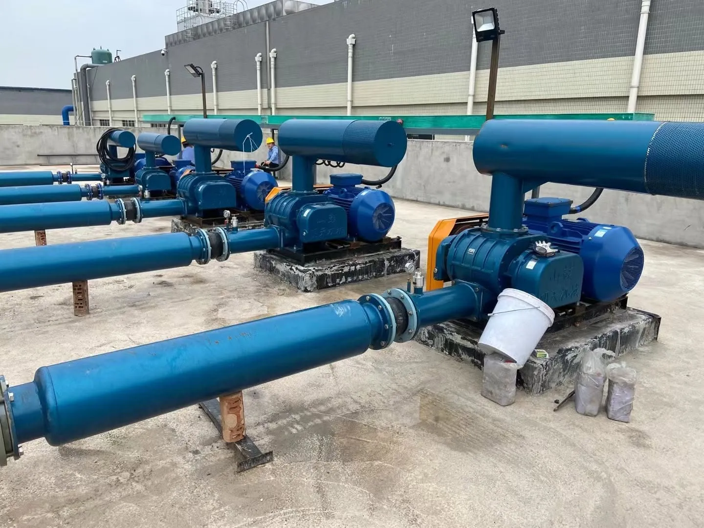 SHANGU MingTian RSR series tri-lobe roots blowers installed for battery factory wastewater aeration project, cast iron positive displacement roots blower unit with pipeline assembly